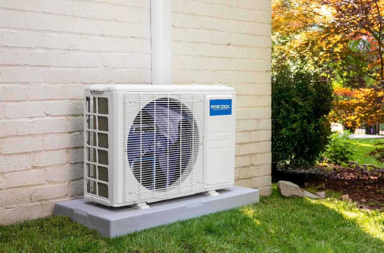 Mrcool DIY 5th gen multi 3 zone 18k btu condenser DIY-MULTI3-18HP230D-O  r-454b outside condenser installed view. 