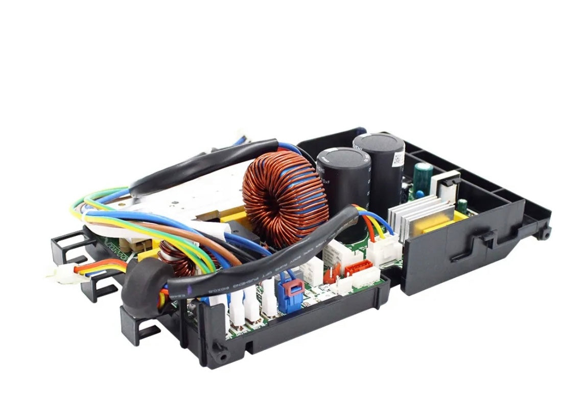 Genuine MRCOOL 24K outdoor condenser control board, OEM part 17222000037115, for DIY-24-HP-C-230C25 heat pump, angled side view showing copper coils, capacitors, circuit board, heat sink, and electrical connections.