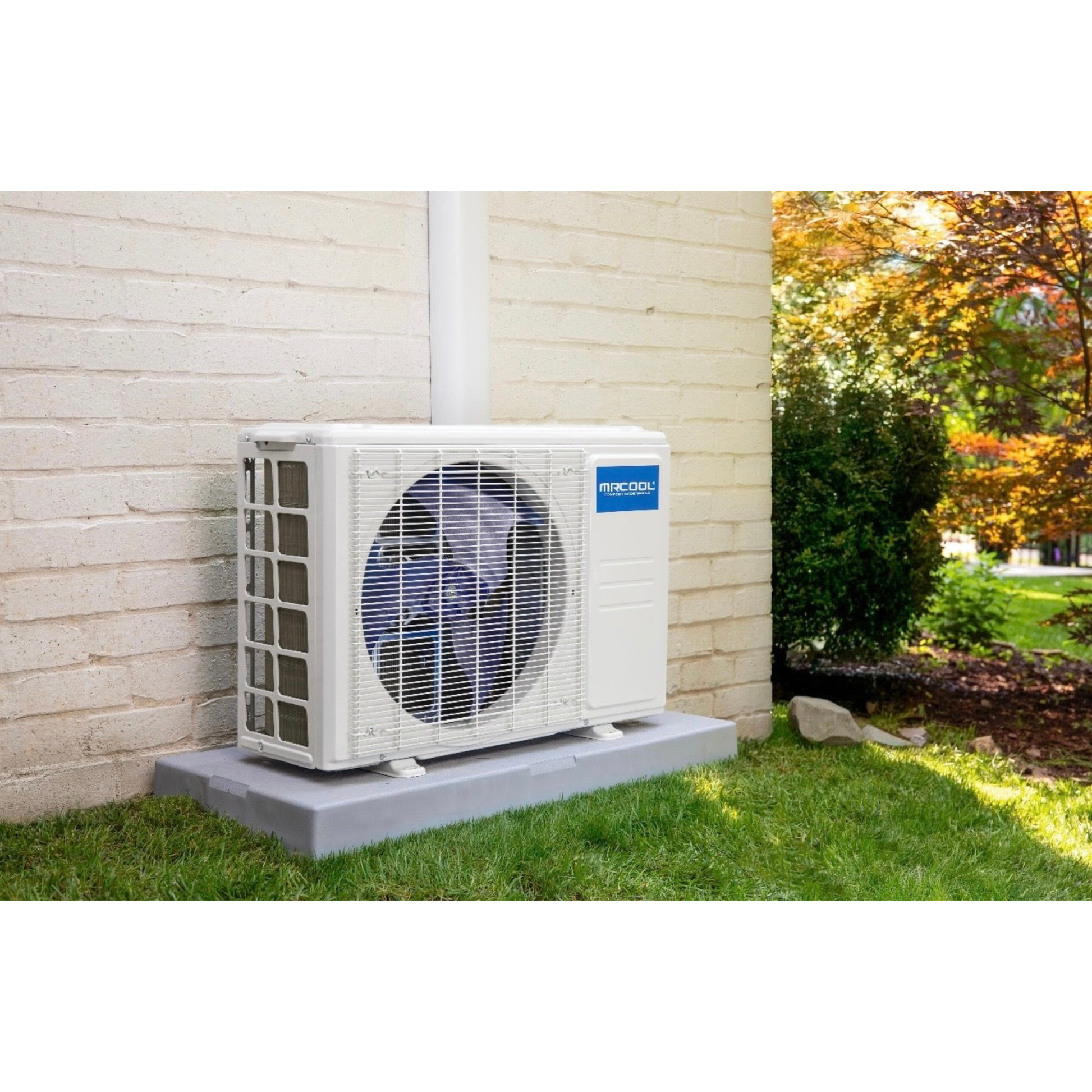 MRCOOL DIY mini split outdoor condenser installed beside home for energy efficient ductless heating and cooling system performance year round