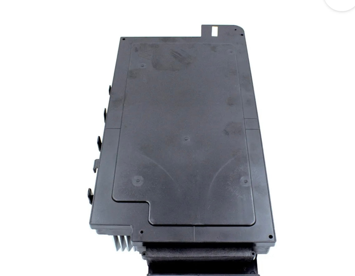 Top-down view of the underside of MRCOOL OEM electronic control box subassembly, part 17222300002929, for DIY-MULTI3-27HP230C 27,000 BTU multi-zone heat pump condenser, showing black protective housing, mounting points, and aluminum heat sink fins.